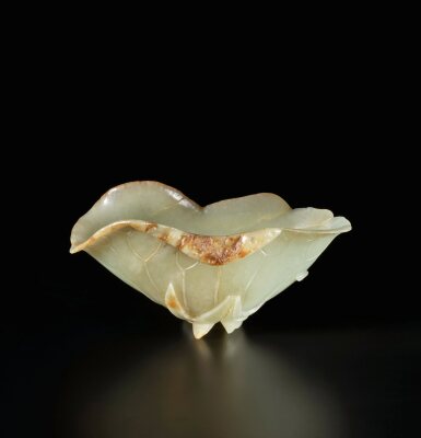 View full screen - View 1 of Lot 273. A celadon jade 'lotus leaf' brush washer, 17th century | 十七世紀 青玉雕荷葉式洗.