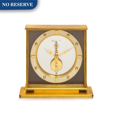 View full screen - View 1 of Lot 8079. Jaeger-LeCoultre | A gilt brass desk clock with skeletonized dial, Circa 1990 | 積家 | 鍍金銅製座鐘,備鏤空錶盤,約1990年製.