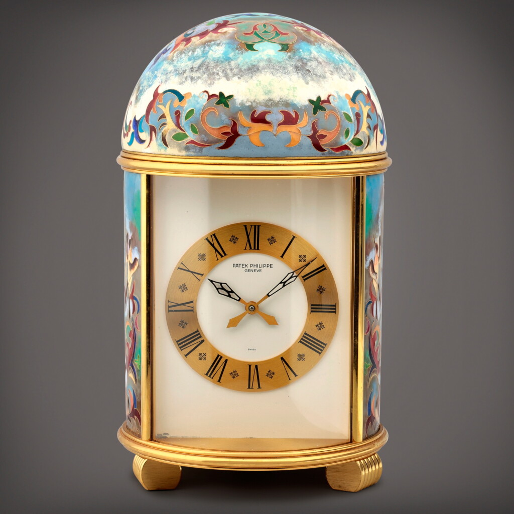 View full screen - View 1 of Lot 49. Pendulette Dôme 'Enluminures, Griffons et Licornes', Reference 1154M-001 A gilt brass and cloisonné enamel solar dome table clock Made in 1978 | 百達翡麗 | Pendulette Dôme 'Fleurs Plus Claire' 型號 1154M-001 鍍金銅及掐絲琺瑯座鐘,製作年份約 1980.