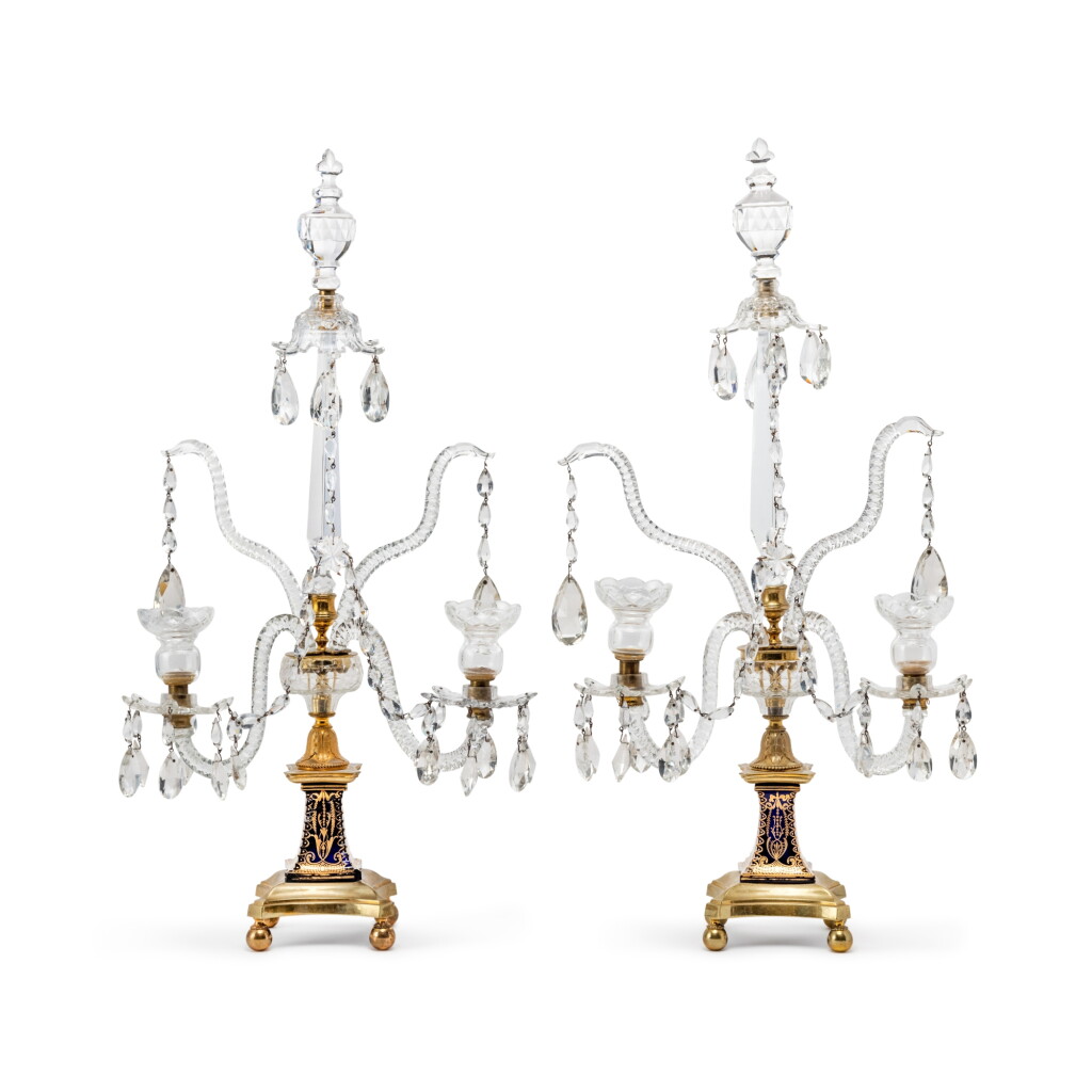 View full screen - View 1 of Lot 362. A Pair of George III Gilt Brass Mounted Cobalt and Colorless Glass Two-Light Candelabra, Attributed to Parker and Perry, Circa 1790.