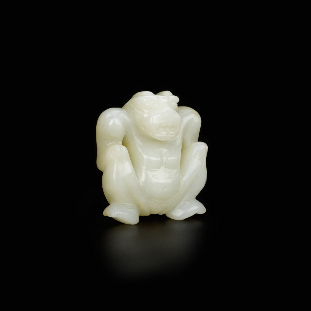 View full screen - View 1 of Lot 96. A small white jade figure of a mythical beast, Qing dynasty, 18th century.