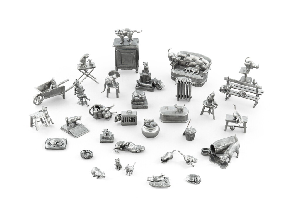 View full screen - View 1 of Lot 412. A group of thirty-two tin cat figurines, modern | Lot de trente-deux figurines de chats en étain, modernes.