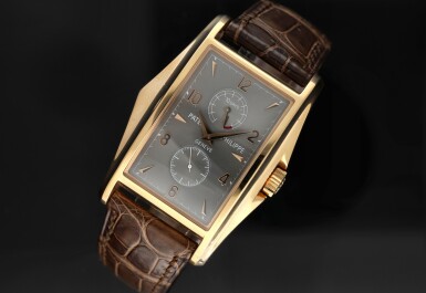 View full screen - View 1 of Lot 117. Reference 5100R-001 A limited edition pink gold rectangular wristwatch with 10 day power reserve, made to commemorate the millennium, Circa 2000.