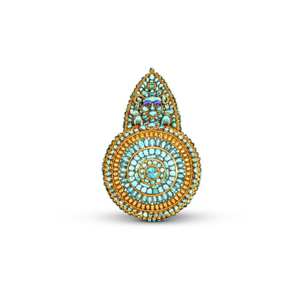 View full screen - View 1 of Lot 828. A turquoise and gold 'mooneater' ornament (Cheppu), Tibet, 1875-1900.
