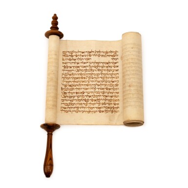 View full screen - View 1 of Lot 91. Fourteenth-Century Scroll of Esther (Megillat Esther) on Carved Wooden Roller.