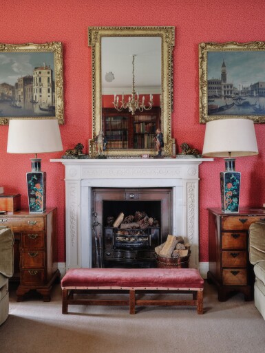 View full screen - View 1 of Lot 8. A George II carved giltwood mirror, circa 1740, in the manner of William Kent.