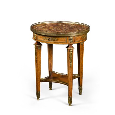 View full screen - View 1 of Lot 46. A Louis XVI style ormolu-mounted tulipwood occasional table, late 19th century.