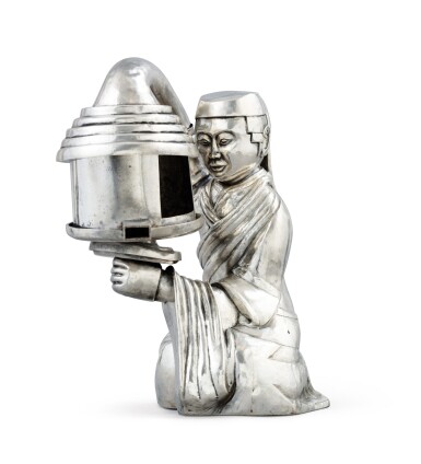 View full screen - View 1 of Lot 58. A Chinese silver night-light shaped as a kneeling Chinese, 19th century | Veilleuse en argent en forme de Chinois agenouillé, Chine, XIXe siècle.