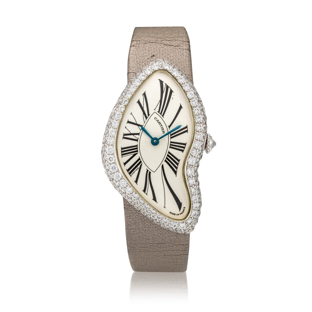 View full screen - View 1 of Lot 65. Crash, Ref. 2462 White gold and diamond-set wristwatch Circa 1999 | 卡地亞 2462型號「Crash」白金鑲鑽石腕錶,年份約1999.