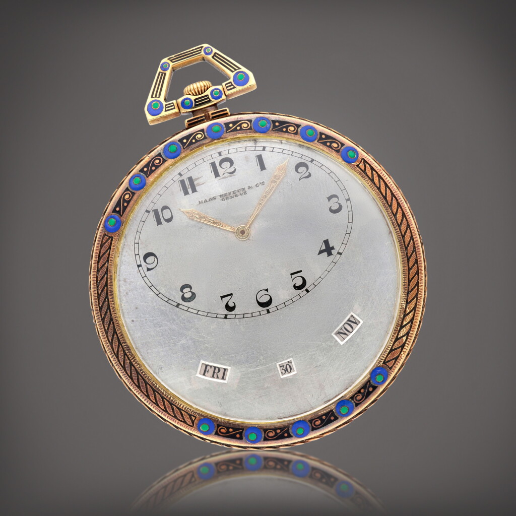View full screen - View 1 of Lot 646. A yellow gold and enamel keyless wind open face triple calendar watch, Circa 1920.