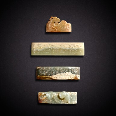 View full screen - View 1 of Lot 7907. Four jade scabbard slides, Han dynasty | 漢 玉劍璏四件.