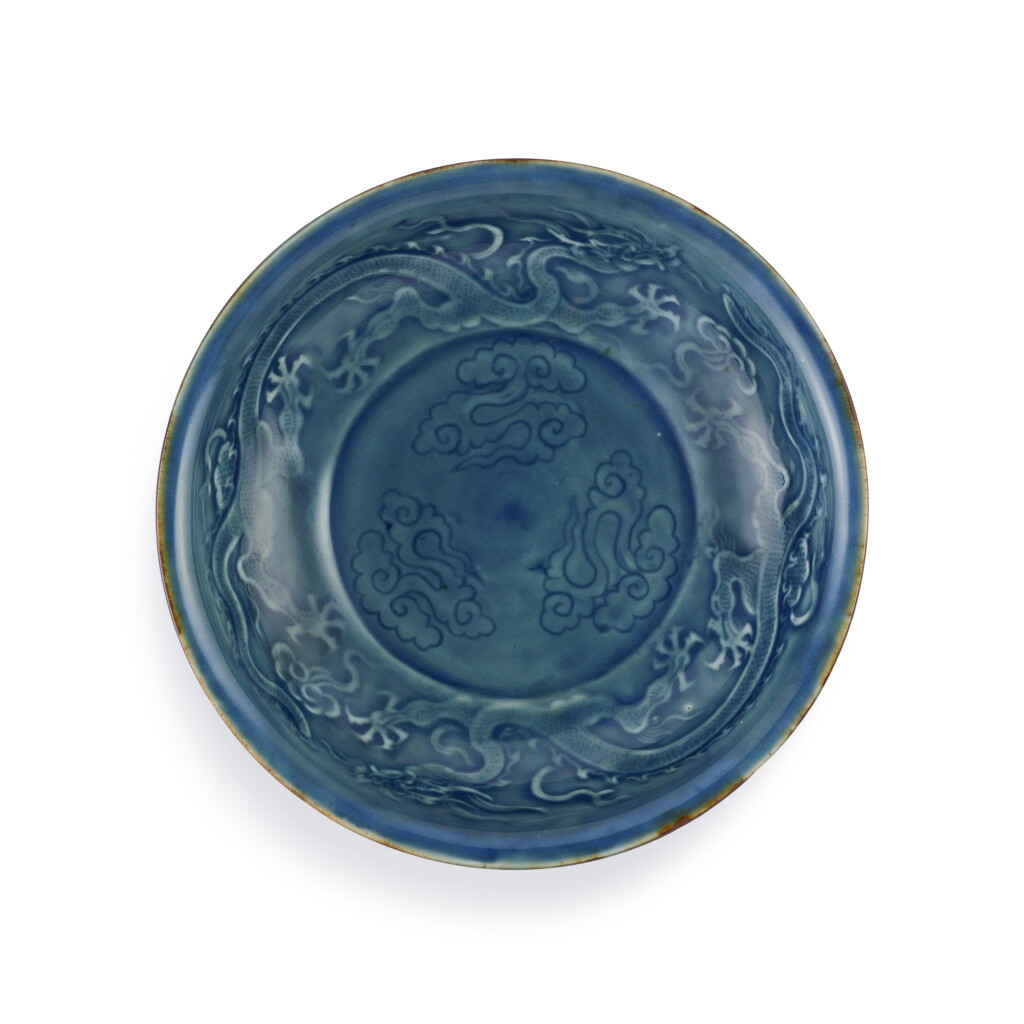View full screen - View 1 of Lot 48. An extremely rare imperial blue and brown-glazed 'dragon' dish Ming dynasty, Hongwu period | 明洪武 外醬釉內藍釉雲龍紋盤.
