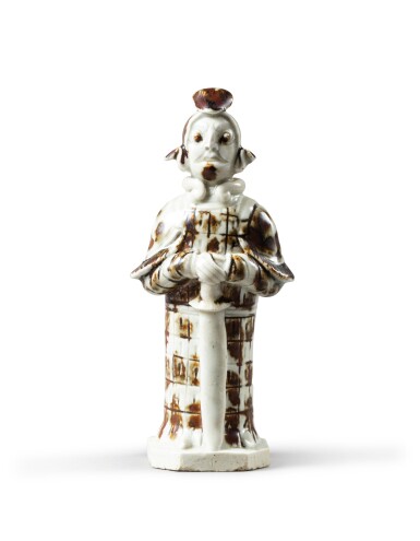 View full screen - View 1 of Lot 30. A celadon and brown-glazed pottery figure of a warrior Probably Yuan dynasty | 或為元 點褐斑武士陶俑.
