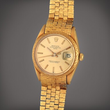View full screen - View 1 of Lot 318. Oyster Perpetual Date, Reference 1503 | A yellow gold wristwatch with date and bracelet | Circa 1968.