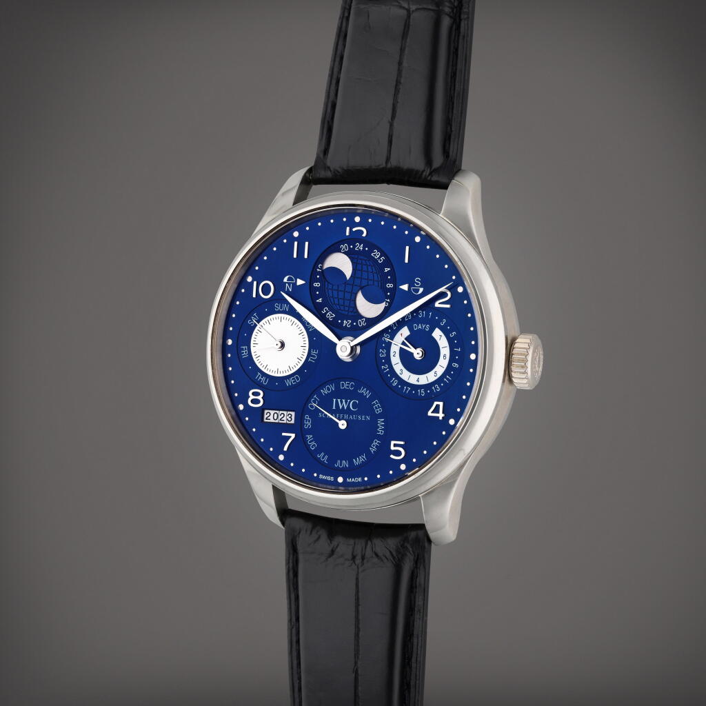 View full screen - View 1 of Lot 348. Reference IW503203 Portuguese | A white gold automatic perpetual calendar wristwatch with moon phases and 7 day power reserve indication, Circa 2020.