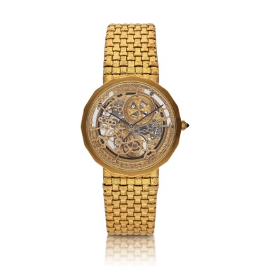 View full screen - View 1 of Lot 351. A yellow gold skeletonized bracelet watch, Circa 1990.