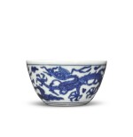 A blue and white 'dragon and phoenix' cup, Mark and period of Wanli | 明萬曆 青花龍鳳紋盃 《大明萬曆年製》款
