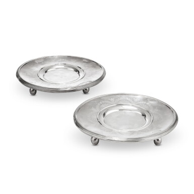 View full screen - View 1 of Lot 1110. A pair of silver sauce-boat stands, Henry Auguste, Paris, 1787-1788 | Paire de supports de saucières en argent par Henry Auguste, Paris, 1787-1788.