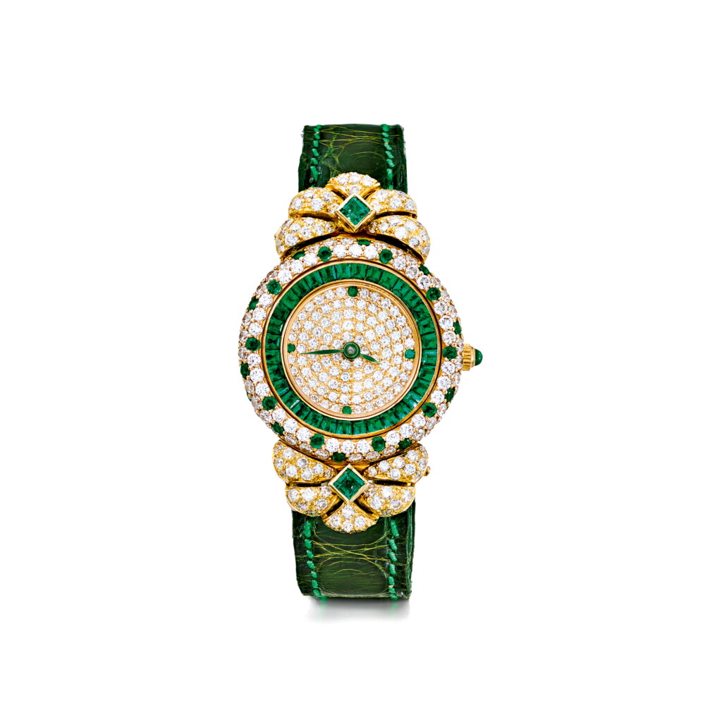 View full screen - View 1 of Lot 886. GRAFF | A YELLOW GOLD DIAMOND AND EMERALD-SET WRISTWATCH, CIRCA 2000 | 格拉夫 | 黃金鑲鑽石及綠寶石腕錶,年份約2000.