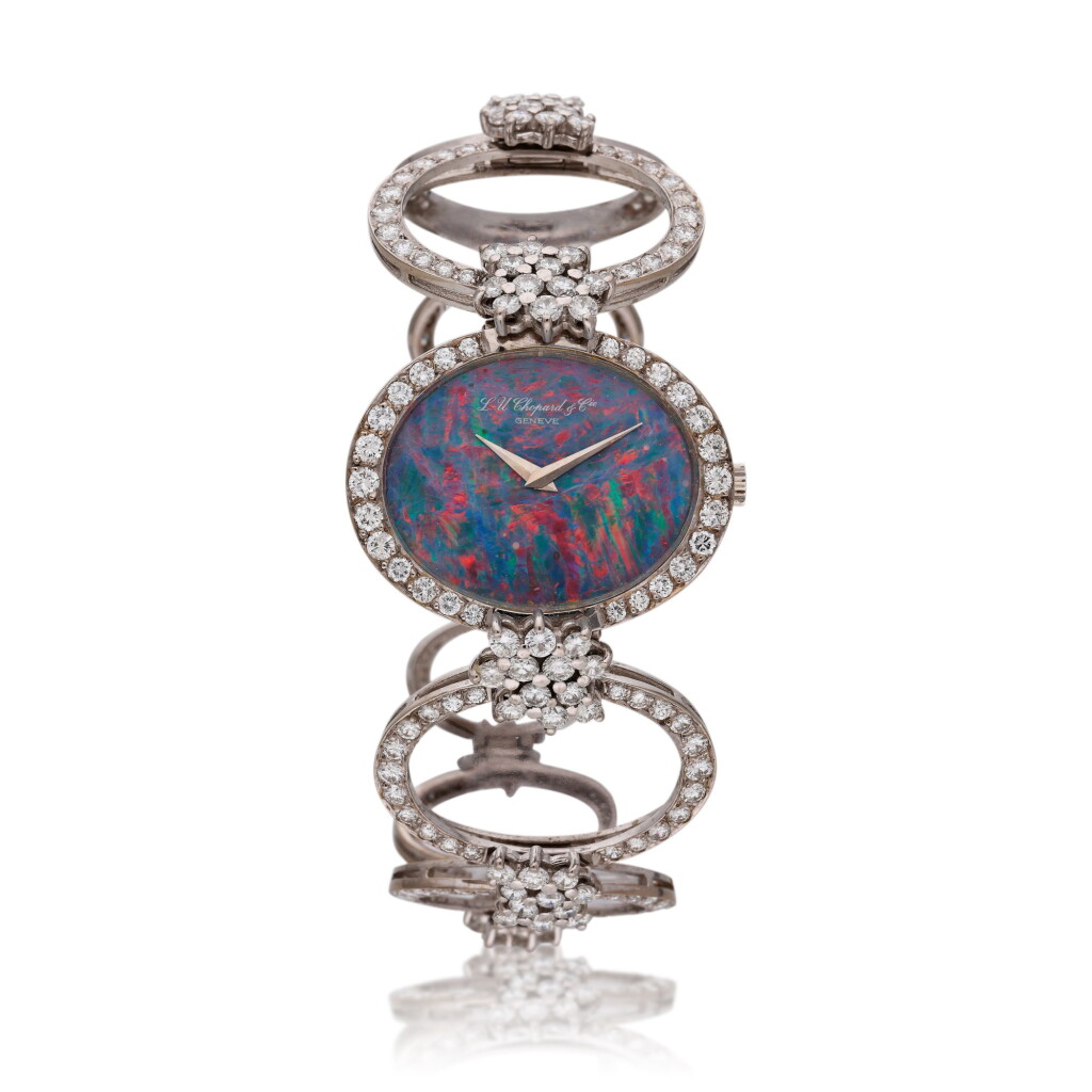 View full screen - View 1 of Lot 369. Reference 5029 1 | A white gold and diamond set bracelet watch with black opal dial, Circa 2001.