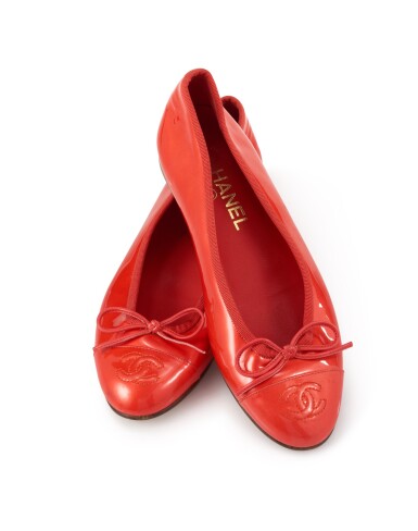View full screen - View 1 of Lot 136. CHANEL | PAIR OF ORANGE PATENT LEATHER FLATS .