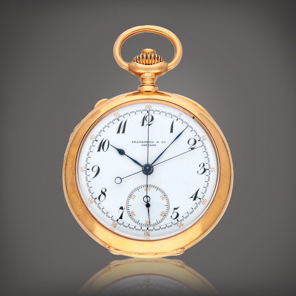 View full screen - View 1 of Lot 411. Retailed By Spaulding & Co.: A yellow gold split chronograph open faced pocket watch | Circa 1900 .
