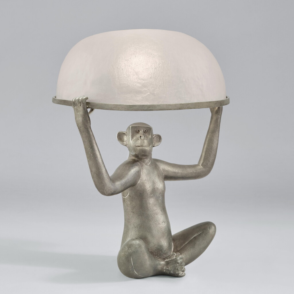 View full screen - View 1 of Lot 101. "Singe Allumé" Table Lamp.