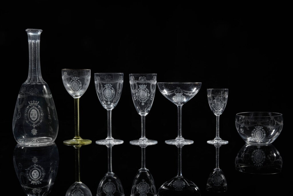 View full screen - View 1 of Lot 1209. A Continental etched and engraved armorial glass part service, second half 19th century.