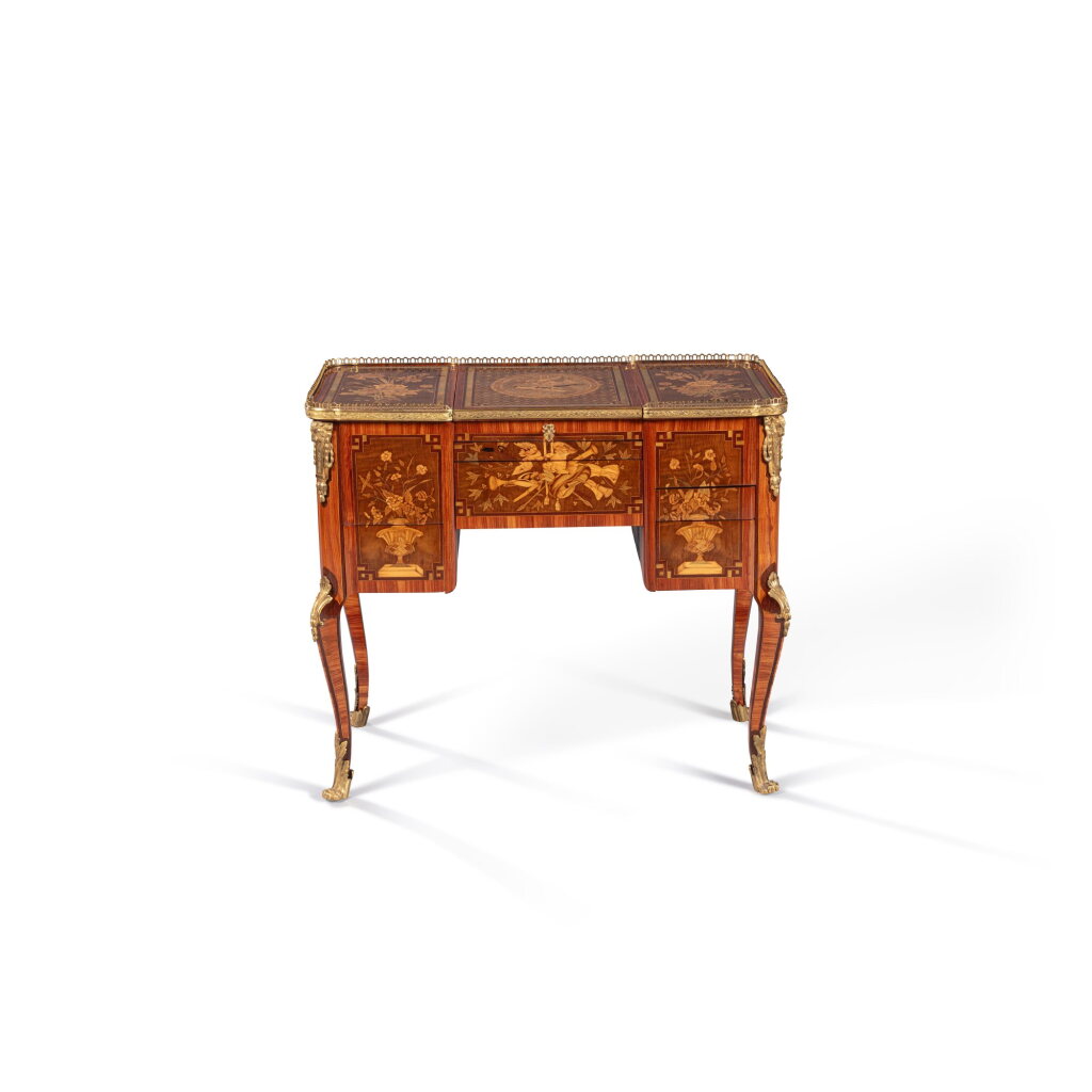 View full screen - View 1 of Lot 814. A late Louis XV gilt-bronze mounted tulipwood, kingwood, mahogany, amaranth, yew, whitebeam, holly and dyed maple marquetry toilet table transformed in a working table, circa 1770.