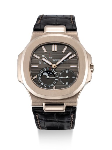 View full screen - View 1 of Lot 8008. Patek Philippe | Nautilus, Reference 5712, A white gold wristwatch with date, moon phases and power reserve indication, Circa 2016 | 百達翡麗 | Nautilus 型號5712 白金腕錶,備日期、月相及動力儲備顯示,約2016年製.