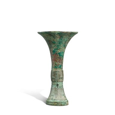 View full screen - View 1 of Lot 5825. An archaic bronze ritual wine vessel, gu, Shang dynasty | 商 青銅獸面紋觚.