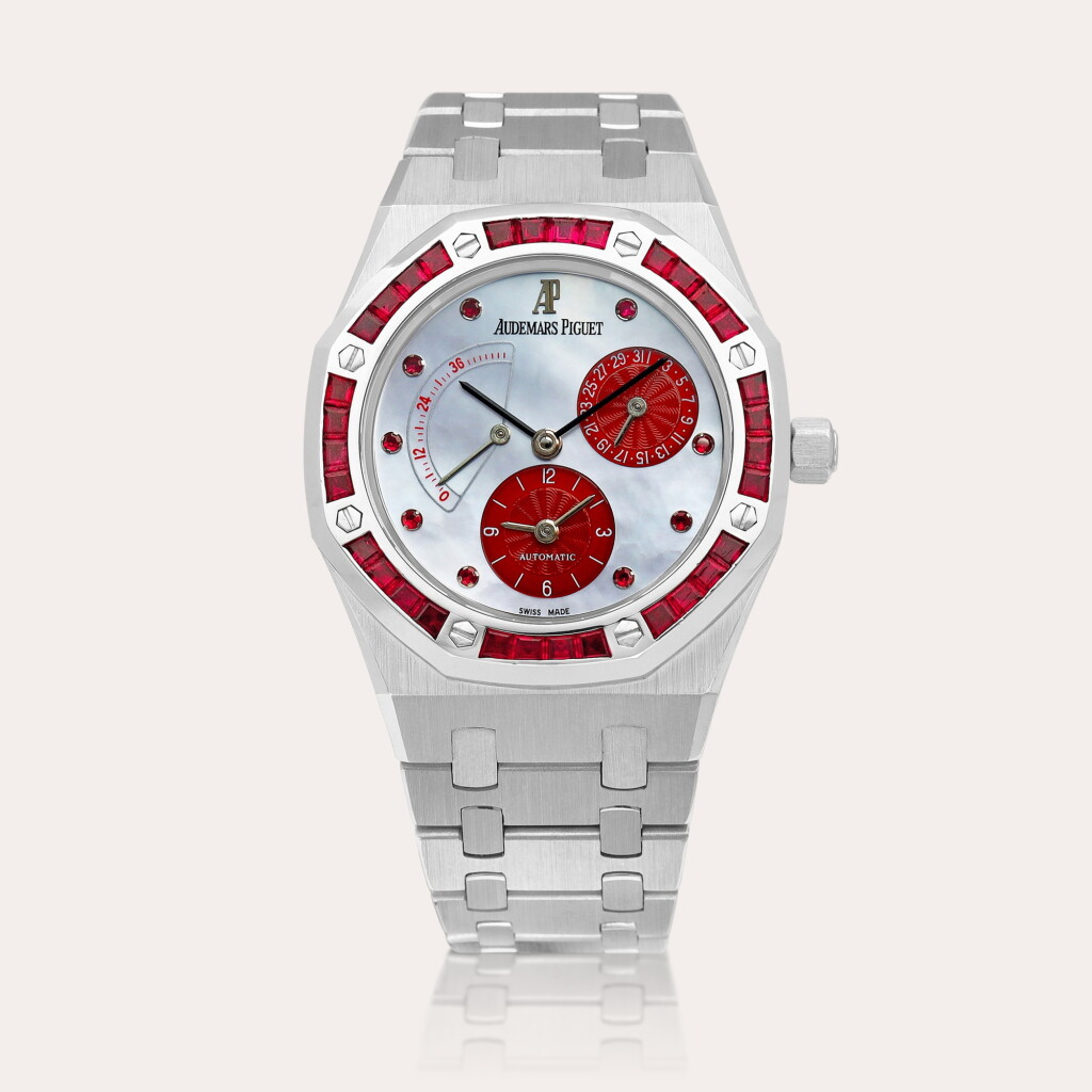 View full screen - View 1 of Lot 2221. Royal Oak, Reference 25744BC | A white gold and ruby-set dual time wristwatch with date, power reserve indication and mother-of-pearl dial, Circa 1994.