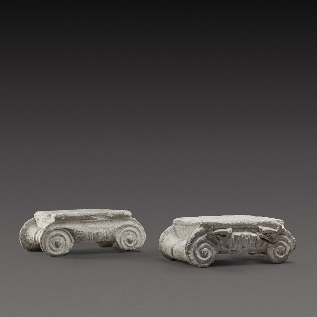 View full screen - View 1 of Lot 79. Two Ionic Marble Capitals, circa 1st Century A.D..