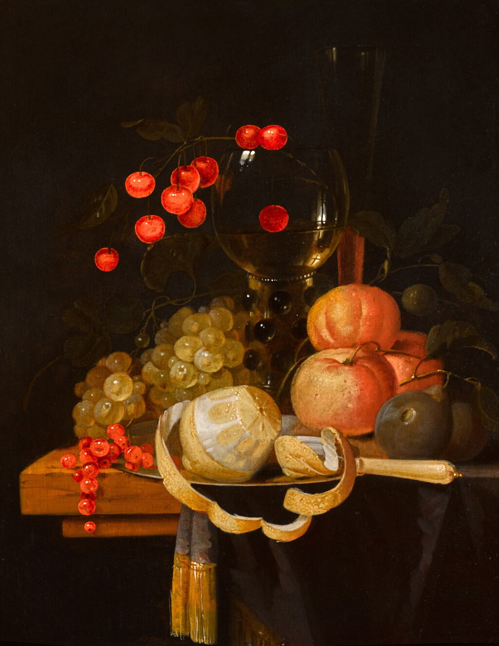 View full screen - View 1 of Lot 308. Still life with grapes, oranges, cherries, a roemer, a plum, a lemon and redcurrants, with a knife on a pewter plate, on a wooden table.