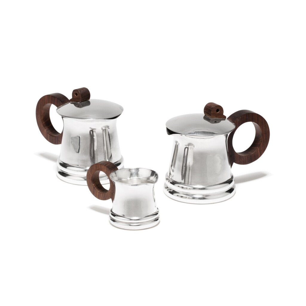 View full screen - View 1 of Lot 65. A silver and rosewood 3-piece coffee-set, Jean E. Puiforcat, Paris, circa 1935 | Service à café toi et moi de trois pièces en argent et palissandre de Rio par Jean E. Puiforcat, Paris, vers 1935.