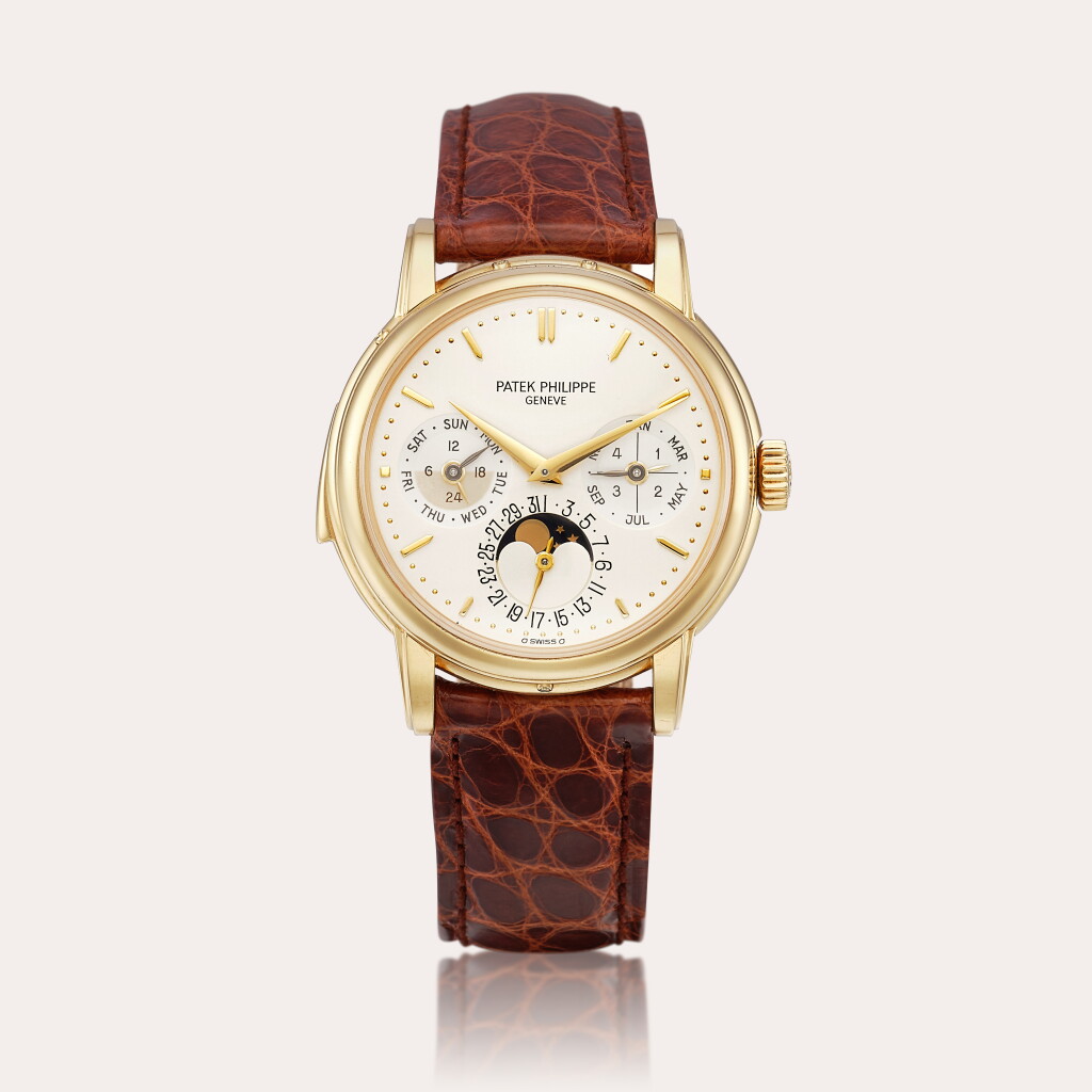 View full screen - View 1 of Lot 2352. Reference 3974 A yellow gold minute repeating perpetual calendar wristwatch with moon phases, 24 hour and leap year indication, Retailed by Gübelin, Made in 1990|百達翡麗|型號3974|黃金三問萬年曆腕錶,備月相、24小時及閏年顯示,由Gübelin發行,1990年製.