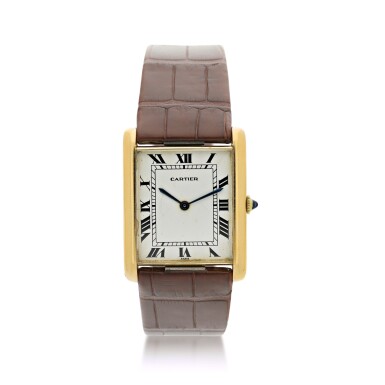 View full screen - View 1 of Lot 21. CARTIER | TANK LOUIS 'JUMBO' A YELLOW GOLD AUTOMATIC RECTANGULAR WRISTWATCH, CIRCA 1975.