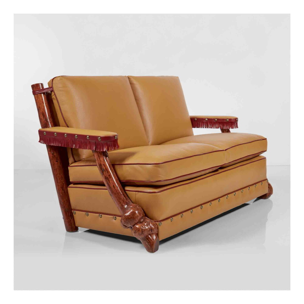 View full screen - View 1 of Lot 309. A Unique Two-Seat Sofa.