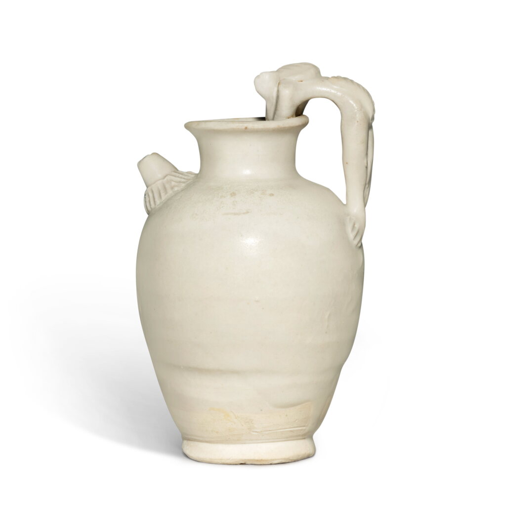 View full screen - View 1 of Lot 132. A small 'Xing' white-glazed ewer, Tang dynasty.