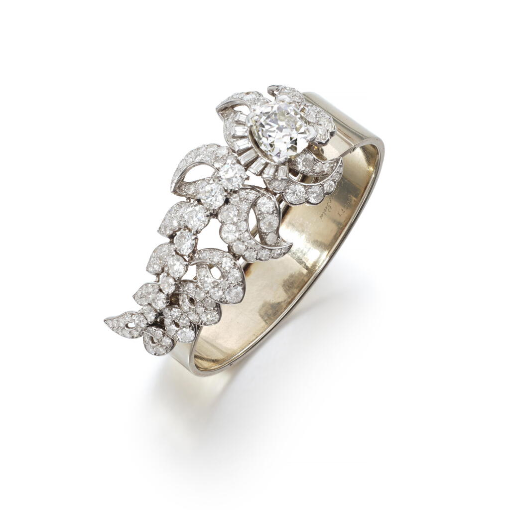 View full screen - View 1 of Lot 542. Diamond bangle/brooch combination, 1930s.