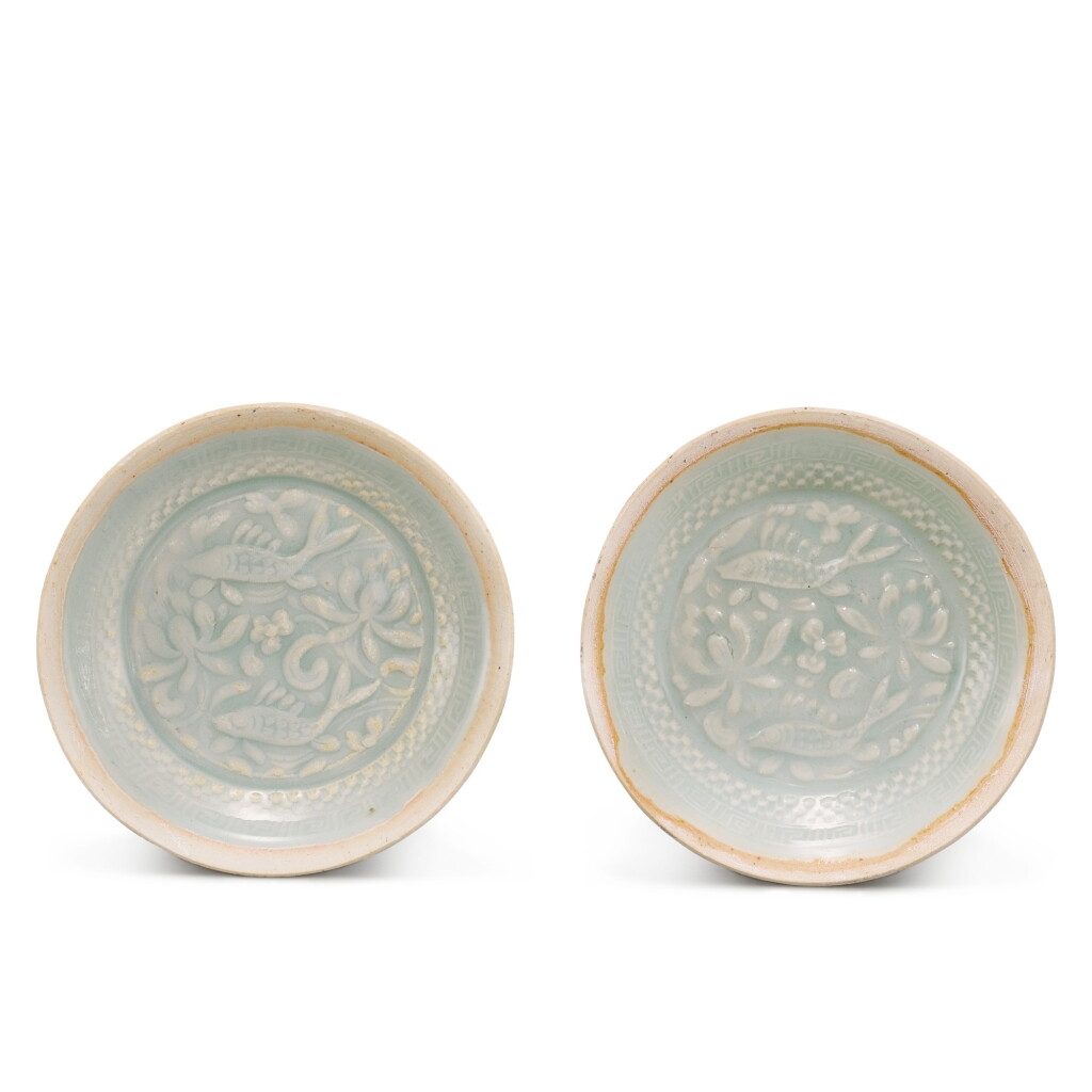 View full screen - View 1 of Lot 327. A PAIR OF QINGBAI 'FISH' SAUCER DISHES SOUTHERN SONG DYNASTY | 南宋 青白釉魚藻紋盤一對.