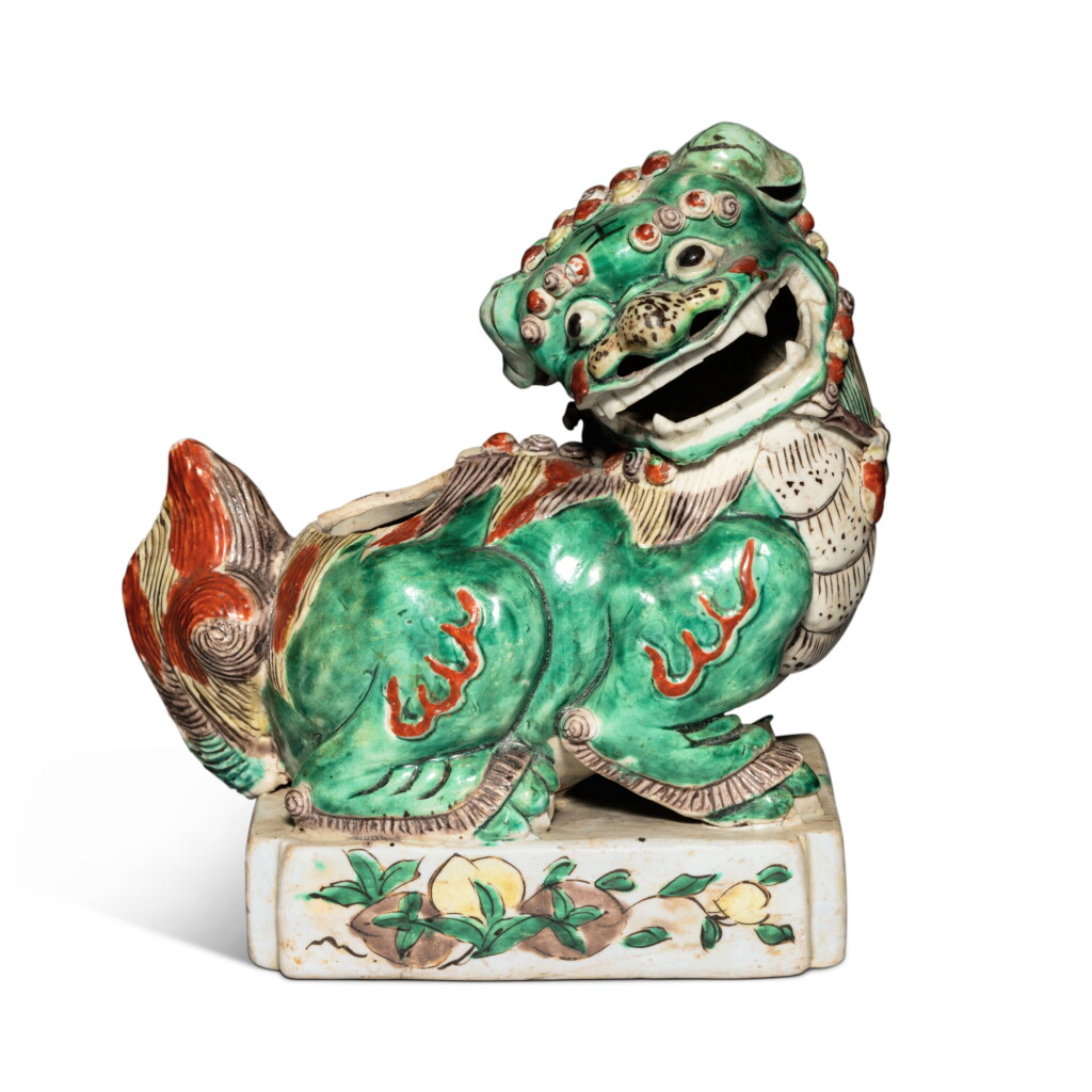 View full screen - View 1 of Lot 640. A famille-verte biscuit 'Buddhist lion' censer, Qing dynasty, Kangxi period | 清康熙 素三彩佛獅香熏.