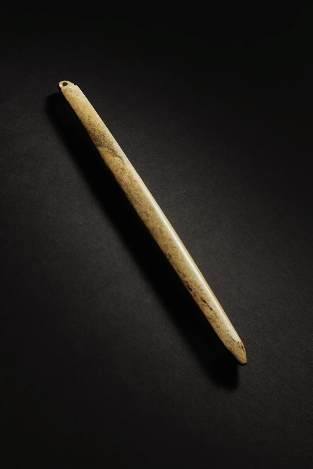 View full screen - View 1 of Lot 49. An archaic brown jade pendant, Neolithic period, Liangzhu culture.