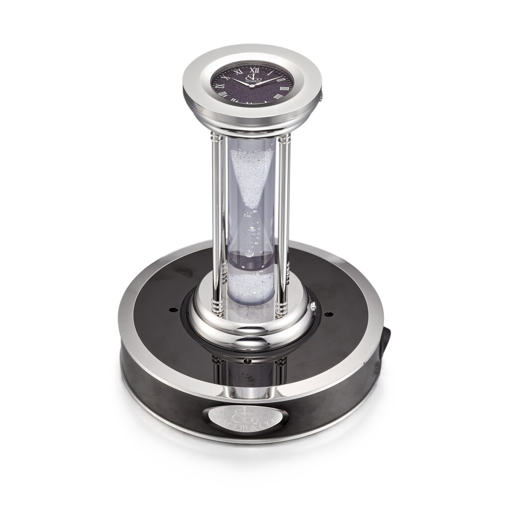 View full screen - View 1 of Lot 8015. A stainless steel dual time zone hourglass with floating white cubic zirconia, Circa 2015 | 精鋼兩地時間沙漏,備懸浮鋯石,約2015年製.