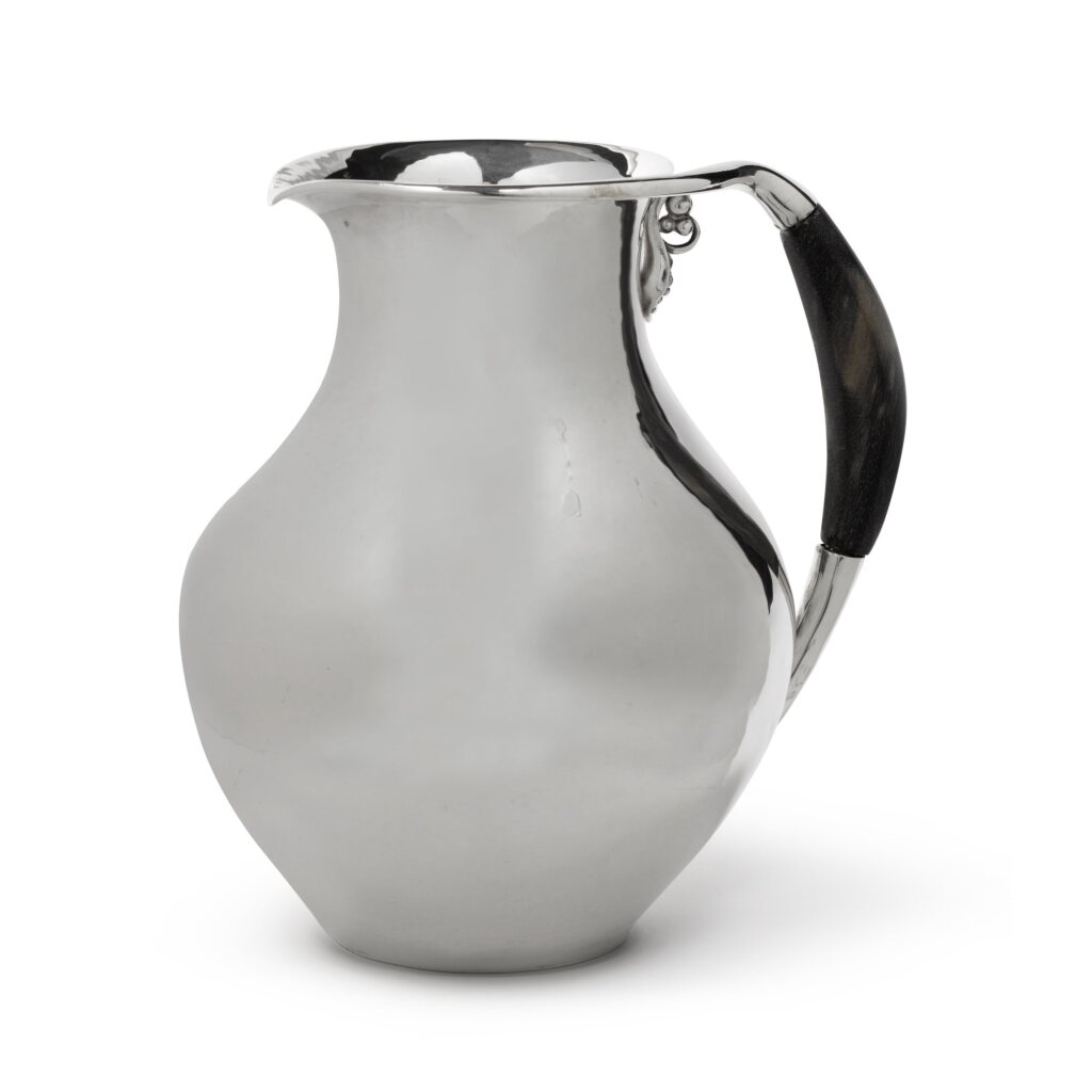 View full screen - View 1 of Lot 8. A Danish Silver Pitcher, No. 385A, Georg Jensen Silversmithy, Copenhagen Circa 1925-1932.