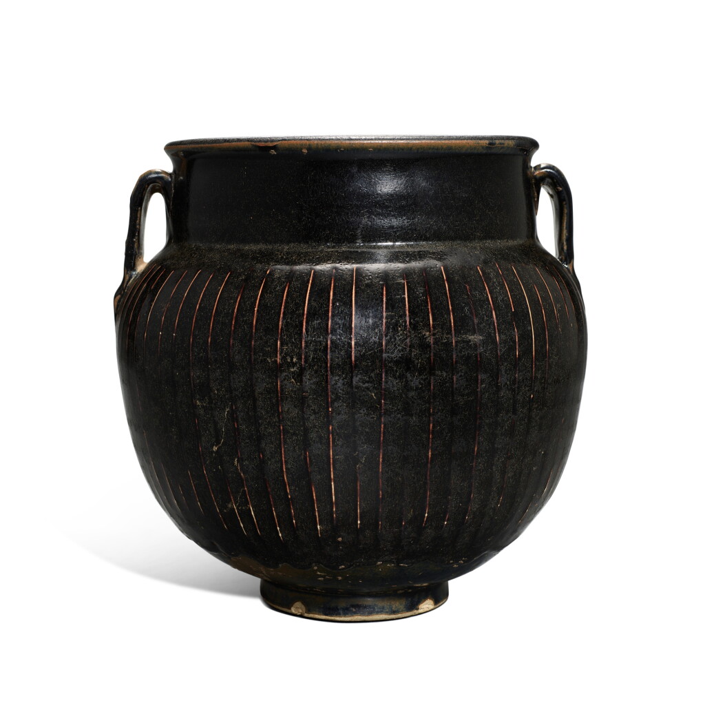 View full screen - View 1 of Lot 9545. A black-glazed 'ribbed' handled jar, Northern Song / Jin dynasty | 北宋 / 金 黑釉棱線紋雙繫罐.