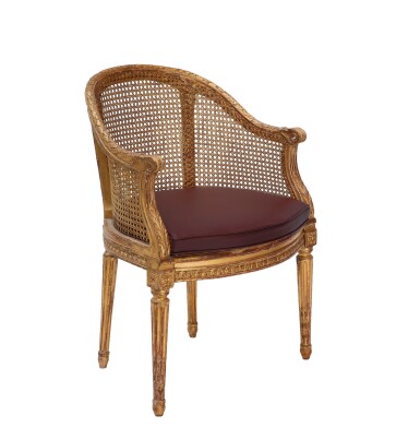 View full screen - View 1 of Lot 44. A LOUIS XVI CARVED GILTWOOD ARMCHAIR FAUTEUIL DE BUREAU BY NICOLAS-LOUIS MARIETTE, CIRCA 1775-1780.