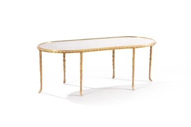 View full screen - View 1 of Lot 81. A gilt-bronze and mirror table, attributed to Maison Baguès .