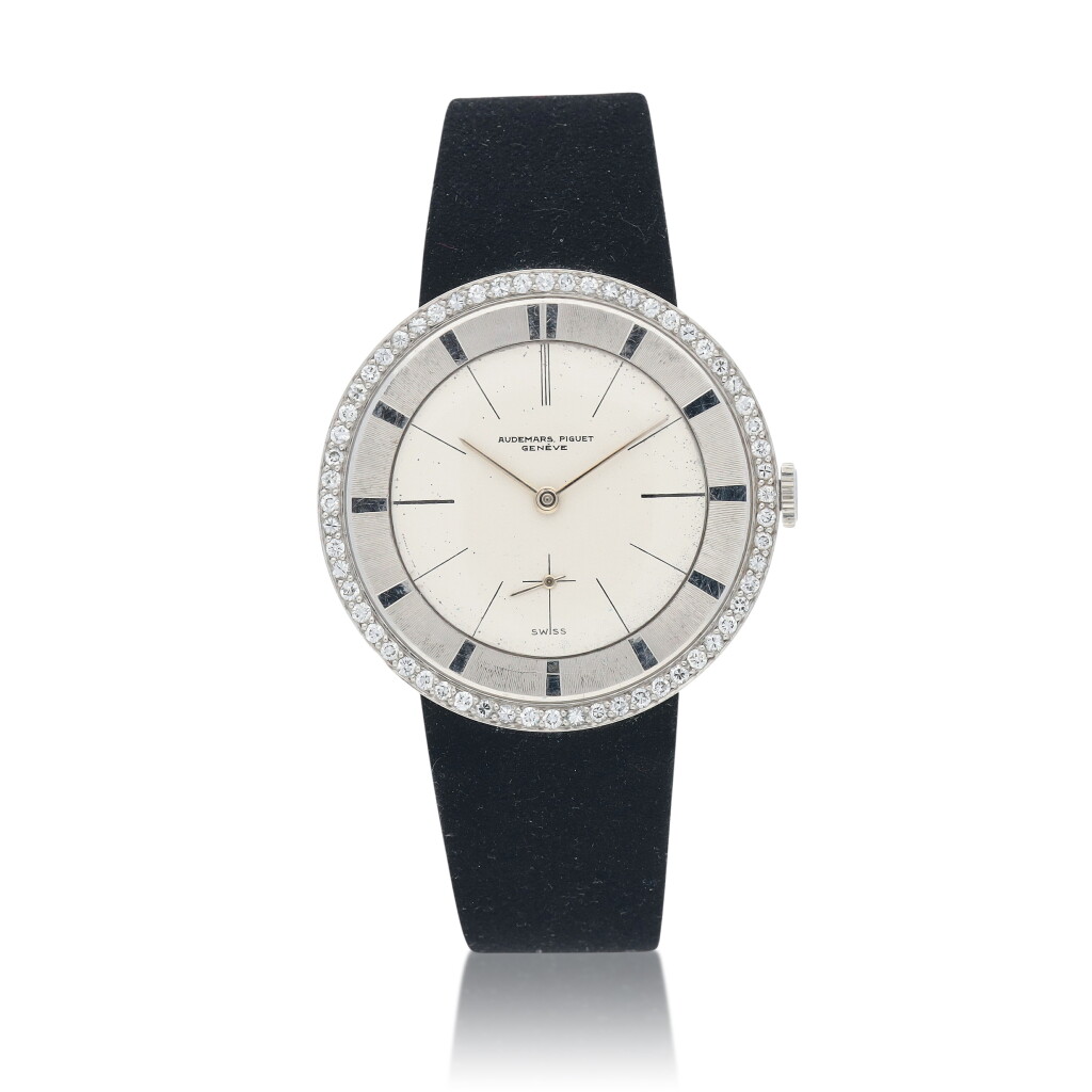View full screen - View 1 of Lot 545. Ref. 5129 Platinum and diamond wristwatch with bracelet Circa 1960.