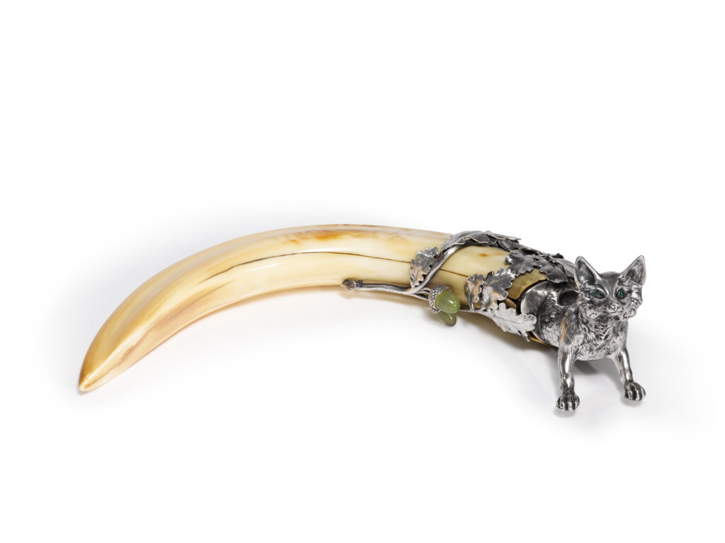 View full screen - View 1 of Lot 56. A German Silver-Mounted Boar's Tooth "Fox" Cigar Cutter, Import Marks for George Adam Scheid, Vienna, Circa 1900.